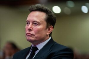 Tesla Elon Musk addio showroom