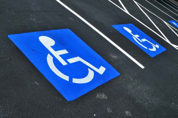 Parcheggio disabili bollo auto 104